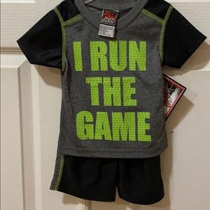 New with tags. 2 piece shirt and shorts set.
